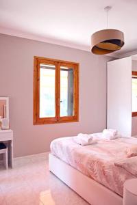 A bed or beds in a room at Appartamento “Casa Losa” Citra 008063-LT-0086