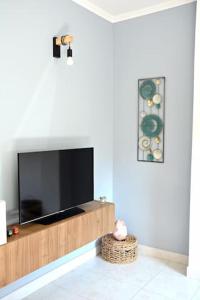A television and/or entertainment centre at Appartamento “Casa Losa” Citra 008063-LT-0086