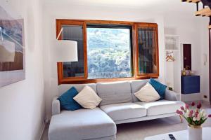 A seating area at Appartamento “Casa Losa” Citra 008063-LT-0086
