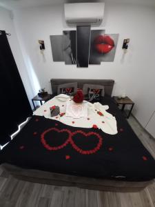 En eller flere senger på et rom på Cocoon Douce Heure