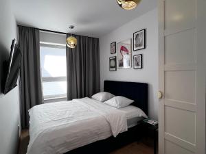 Posteľ alebo postele v izbe v ubytovaní EUROPA22 Apartament "Sen jak w pięciogwiazdkowym hotelu" - Centrum miasta
