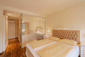 Ένα ή περισσότερα κρεβάτια σε δωμάτιο στο Schlössl Hotel Kindl