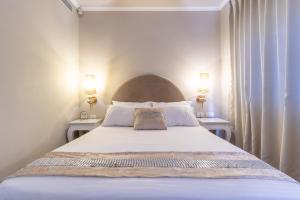 Ένα ή περισσότερα κρεβάτια σε δωμάτιο στο Agripas Boutique Hotel