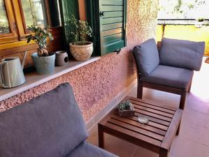 A seating area at Appartamento “Casa Losa” Citra 008063-LT-0086