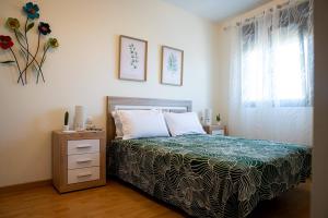 Postel nebo postele na pokoji v ubytování Apartamento El Tajaraste