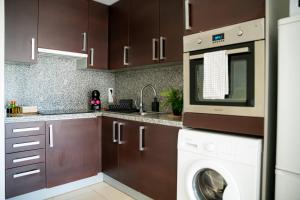 Kuchyň nebo kuchyňský kout v ubytování Apartamento El Tajaraste