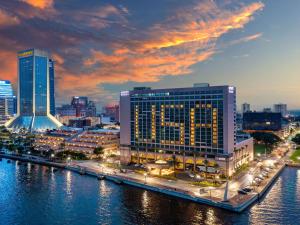 a view of a city with a river and buildings at Hyatt Regency Jacksonville Riverfront in Jacksonville