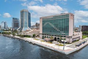 a view of a city with a river and buildings at Hyatt Regency Jacksonville Riverfront in Jacksonville