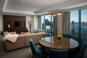 a living room with a couch and a table at Hyatt Regency Jacksonville Riverfront in Jacksonville