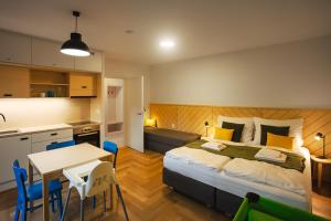 Kuchyň nebo kuchyňský kout v ubytování Hotel Edvard