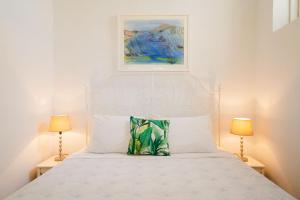A bed or beds in a room at Finca Botanico Secret Garden