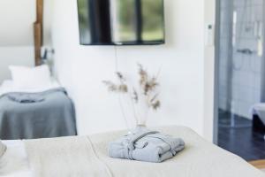 Postel nebo postele na pokoji v ubytování Gumbalde Resort + 37 fotografií