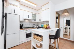 Η κουζίνα ή μικρή κουζίνα στο Home2Book Casa Calma