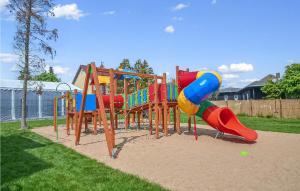 a park with a playground with a slide at Awesome Home In Sianozety With 2 Bedrooms And Wifi in Sianozety