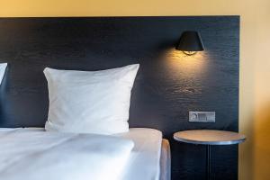 Letto o letti in una camera di Comwell Middelfart