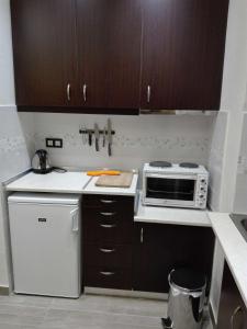 A kitchen or kitchenette at Smart apartment, Athens.