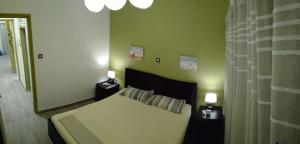 A bed or beds in a room at Smart apartment, Athens.