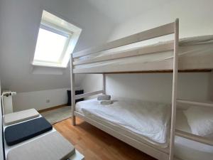 Postel nebo postele na pokoji v ubytování Kleine Robbe + 9 fotografií