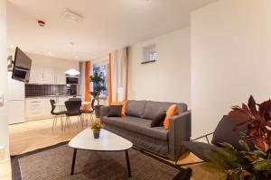 A seating area at ApartDirect Solna