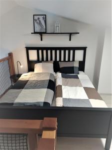 Postel nebo postele na pokoji v ubytování Apartmán Tommy - Zadov
