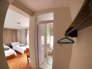 Postel nebo postele na pokoji v ubytování Om Tara Guest House Pvt Ltd