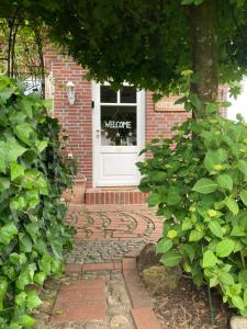 Afbeelding uit fotogalerij van Fewo Lastrup, „Ostblick“ gemütlich unterm Dach in Lastrup +1 foto