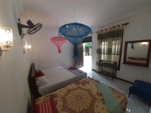 Katil atau katil-katil dalam bilik di Mila Rest Garden