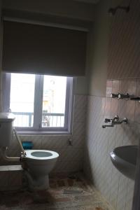 Koupelna v ubytování Om Tara Guest House Pvt Ltd