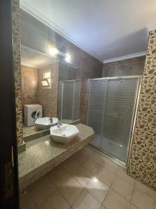 Koupelna v ubytování Dokki Apartments
