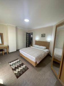 Postel nebo postele na pokoji v ubytování Dokki Apartments