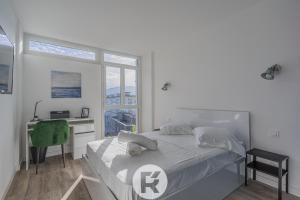 Posteľ alebo postele v izbe v ubytovaní R'Apparts T2 Le Belledonne View