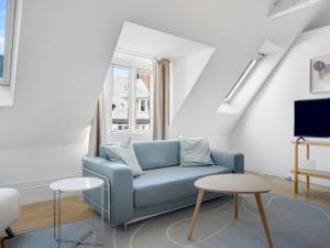 Setusvæði á Sanders Main - Endearing Two-Bedroom Duplex Apartment with a Balcony Next to Magical Nyhavn