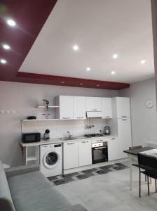 Kuchyň nebo kuchyňský kout v ubytování Casa Orchidea Mazzeo