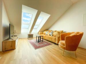 TV a/nebo společenská místnost v ubytování Stylisches Apartment in Grazer Bestlage