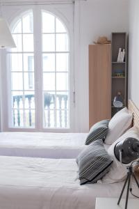 Posteľ alebo postele v izbe v ubytovaní Bel appartement bourgeois au centre-ville de Biarritz