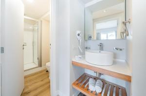 Um banheiro em Cilene del Fuego Suites & Spa