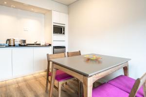 A cozinha ou cozinha compacta de Cilene del Fuego Suites & Spa