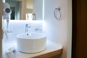 Um banheiro em Cilene del Fuego Suites & Spa