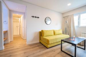 Uma área de estar em Cilene del Fuego Suites & Spa
