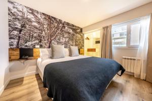 Cama ou camas em um quarto em Cilene del Fuego Suites & Spa