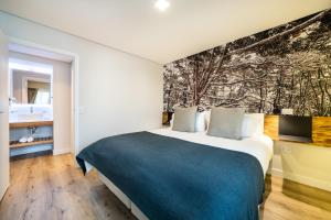 Cama ou camas em um quarto em Cilene del Fuego Suites & Spa