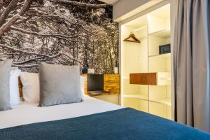 Cama ou camas em um quarto em Cilene del Fuego Suites & Spa mais 37 fotos