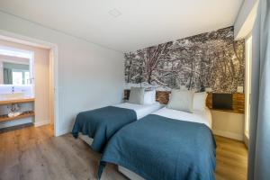 Cama ou camas em um quarto em Cilene del Fuego Suites & Spa
