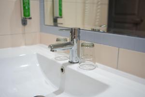 Koupelna v ubytování Hôtel Picardia