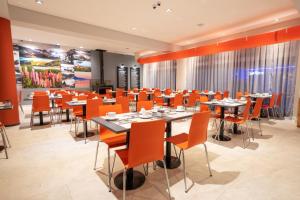 Um restaurante ou outro lugar para comer em Cilene del Fuego Suites & Spa