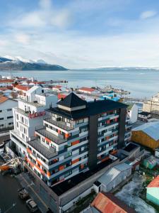 an overhead view of a large building in a city at Cilene del Fuego Suites & Spa in Ushuaia
