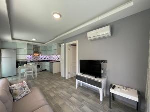 A kitchen or kitchenette at X SUITE APART