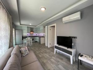 A television and/or entertainment centre at X SUITE APART