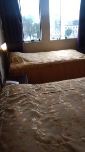 Cama ou camas em um quarto em Hotel Internacional