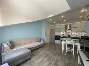 A kitchen or kitchenette at X SUITE APART